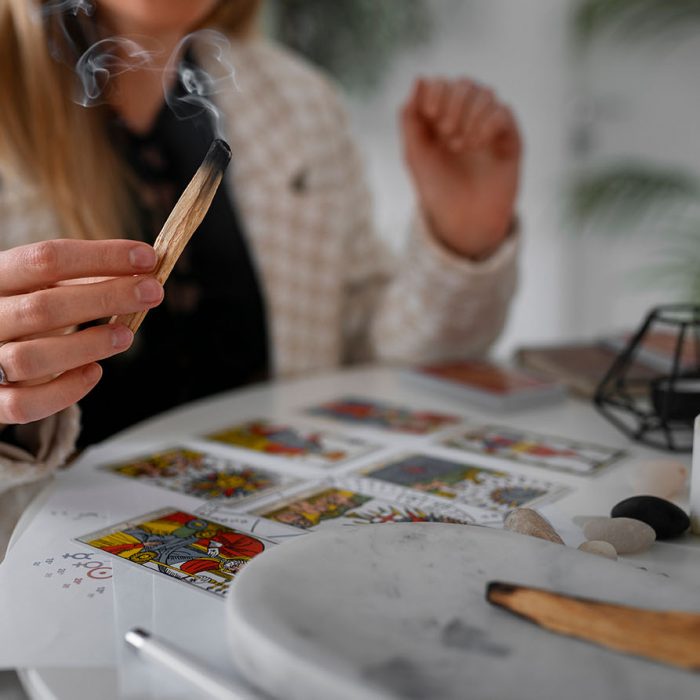 side-view-woman-reading-tarot
